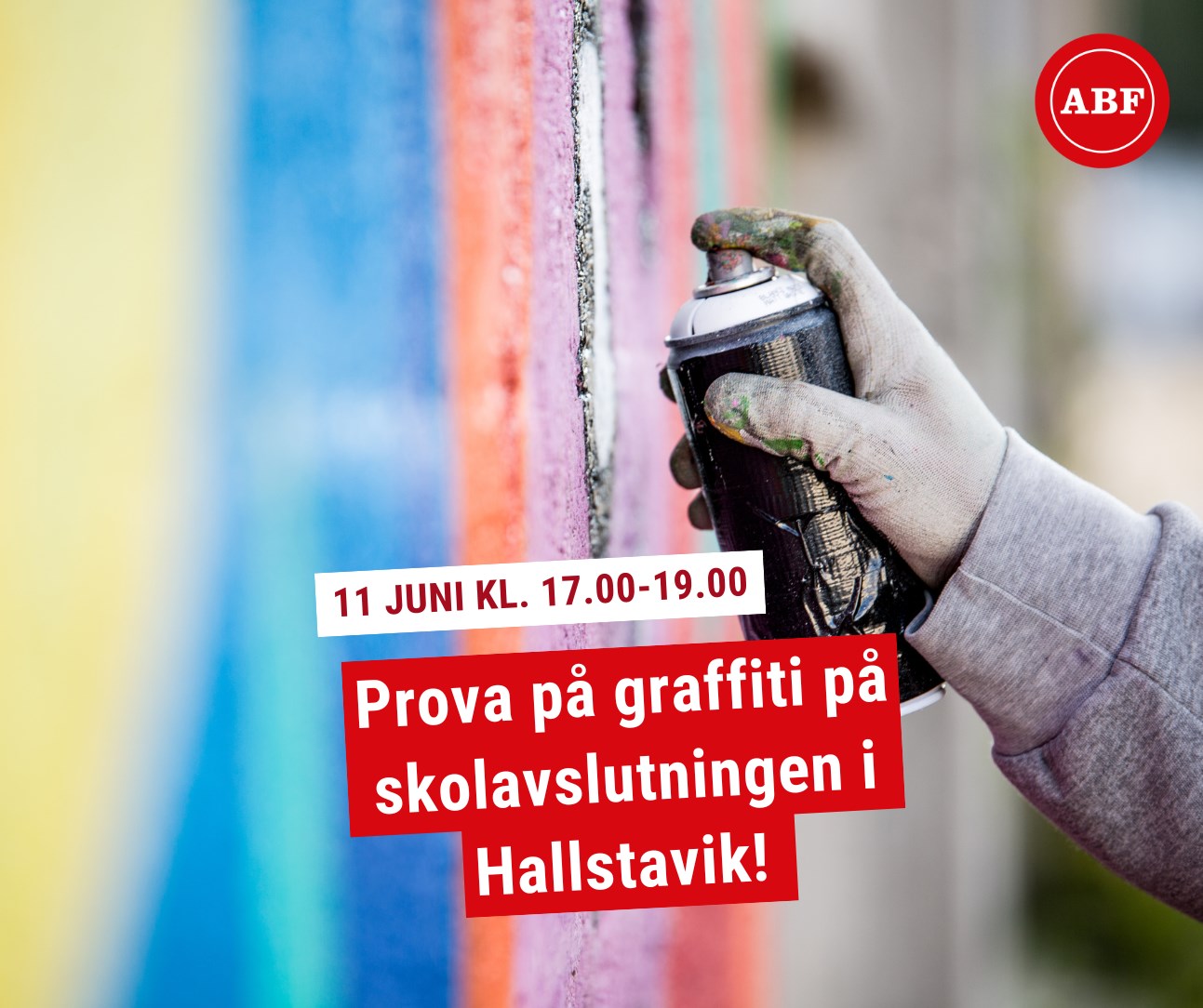 Person som målar graffiti med sprayfärg