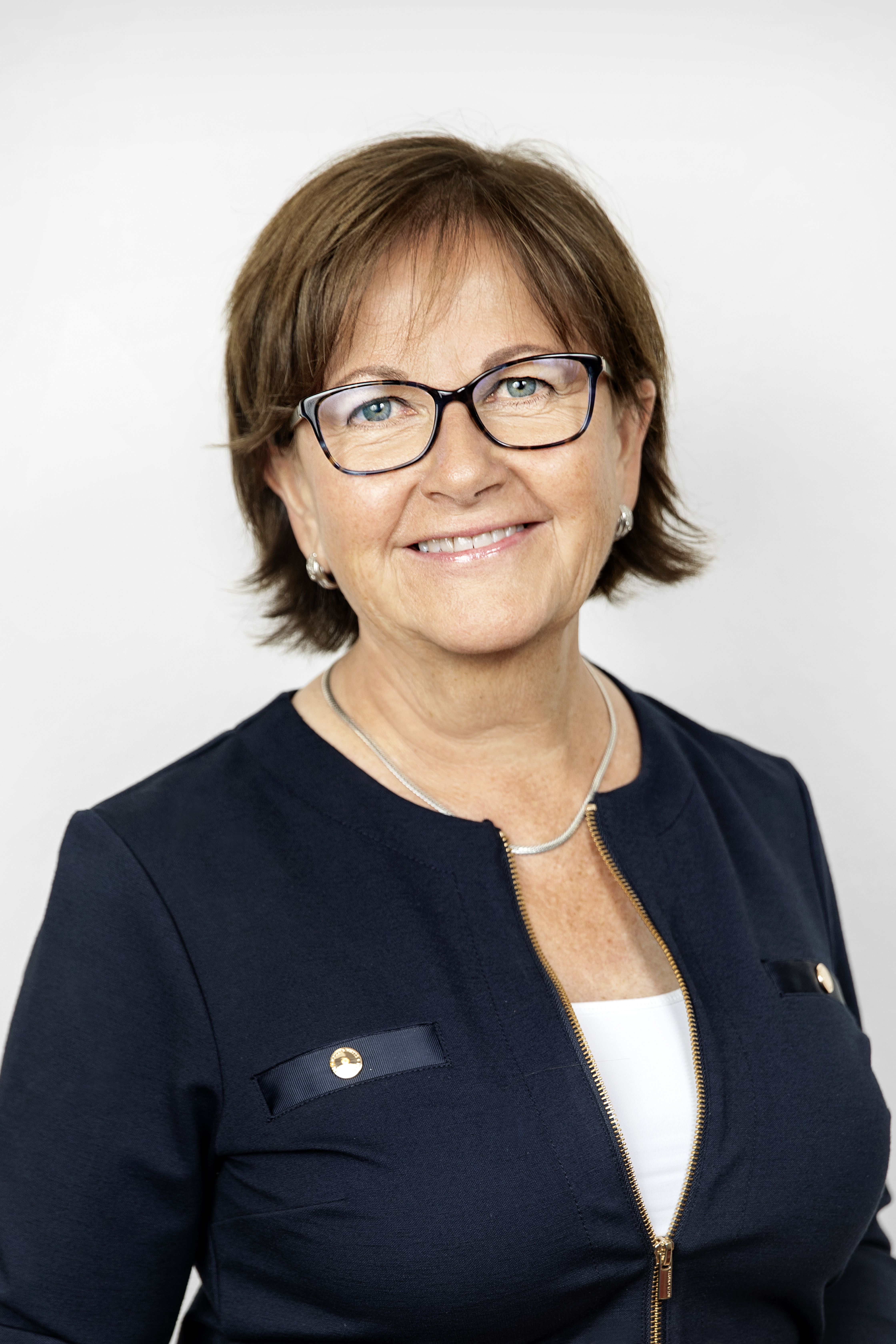 Bild på föreläsaren, medelålders kvinna. 