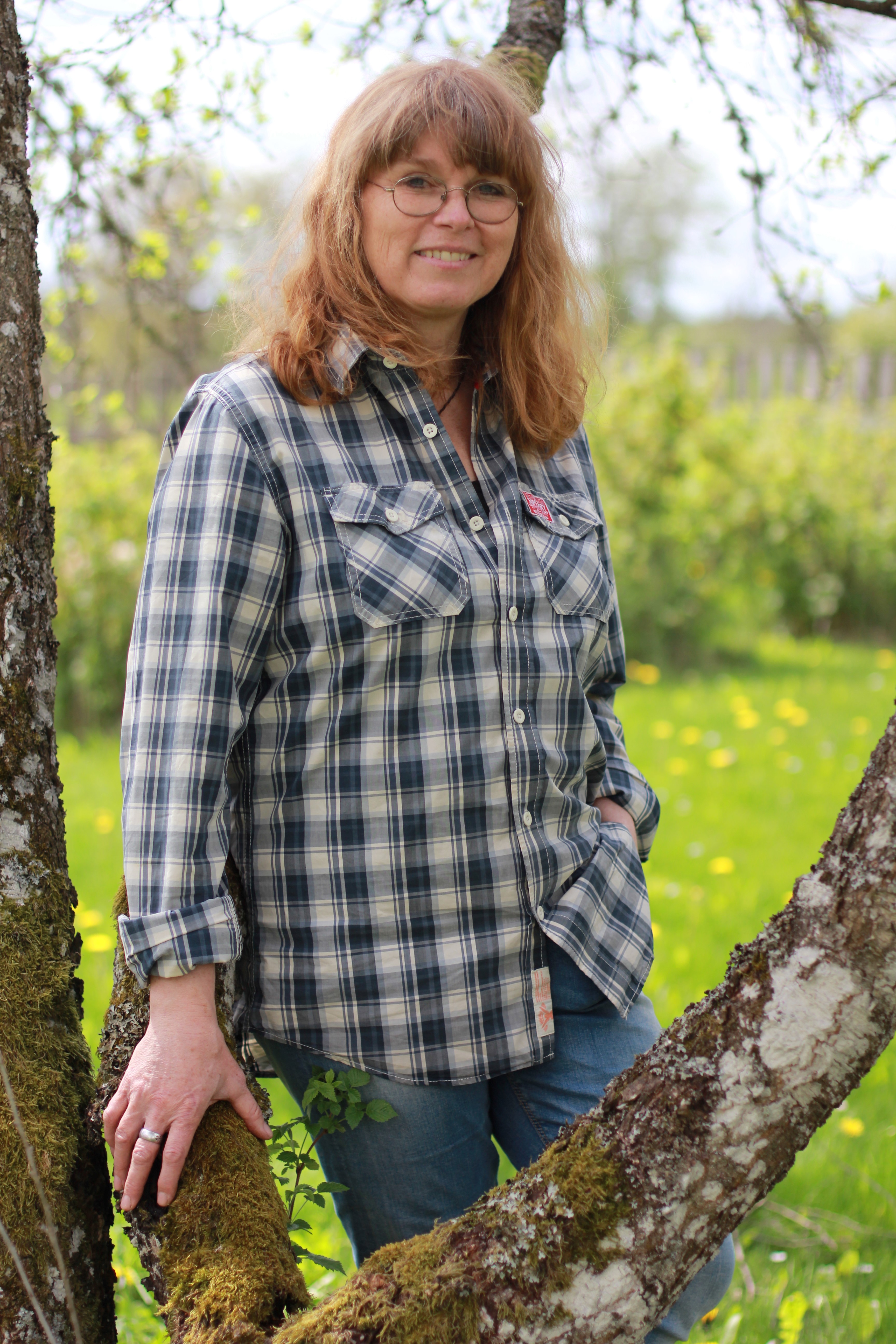 Bild på föreläsaren, medelålders kvinna i friluftskläder 